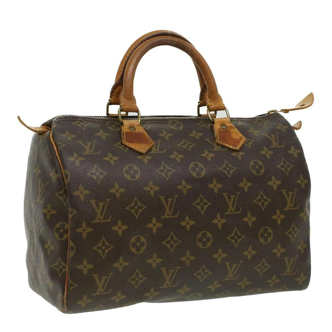 LOUIS VUITTON Monogram Speedy 30 Hand Bag M41526 LV: LOUIS VUITTON Monogram Speedy 30 Hand Bag M41526 LV Brand: LOUIS VUITTON Style: Hand Bag Material: Monogram Canvas Exterior Color: Monogram Bag Height: 8.3inch(Approx) / 21cm(Approx) Bag Depth: 6.7inc