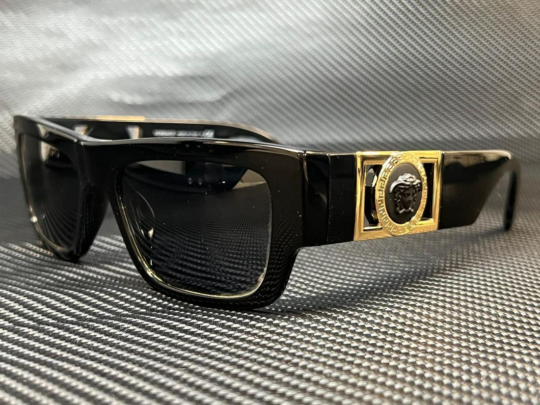 VERSACE VE4416U GB1 87 Black Rectangle 53 mm Men's Sunglasses: VERSACE VE4416U GB1 87 Black Rectangle 53 mm Men's Sunglasses Brand: Versace Frame Color: Black Style: Rectangle Type: Sunglasses New The BIDHAUS Guarantee: All items in this auction are guaranteed to
