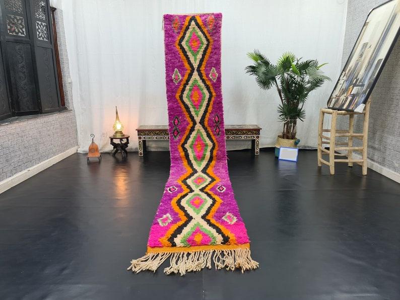 Stunning Pink Runner Rug: Authentic Pink Handmade Moroccan Berber Wool Runner Rug. This loevely tiny rug was handwoven in the Middle Atlas Mountains by local Berbe women weavers using local sheep wool. Size : 2 x 10 feet (60 C