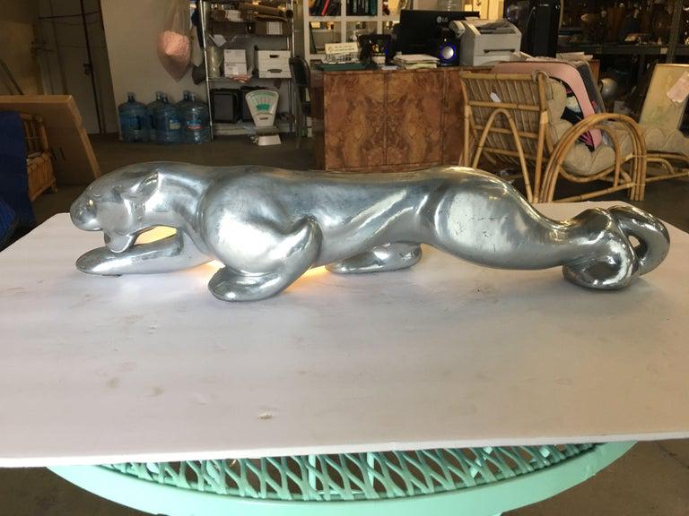 Midcentury Silvertone Panther Aluminum Statue Lamp: Midcentury Silvertone Panther Aluminum Statue Lamp Dimensions:: Height: 4 in (10.16 cm) Dimensions:: Width: 22 in (55.88 cm) Dimensions:: Depth: 4 in (10.16 cm) Materials and Techniques:: Aluminum Pla