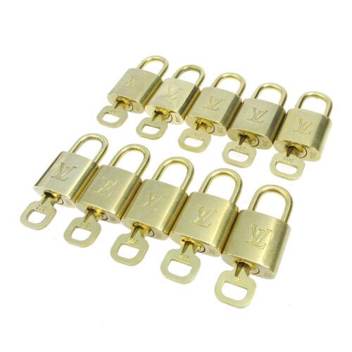 LOUIS VUITTON Padlock & Key Bag Accessories Charm 10 Piece Set Gold: LOUIS VUITTON Padlock & Key Bag Accessories Charm 10 Piece Set Gold Type: Padlock Color: Gold Brand: LOUIS VUITTON Outside Condition: AB: Very Good/Inside Condition: C: Heavily Used The BIDHAUS Guaran