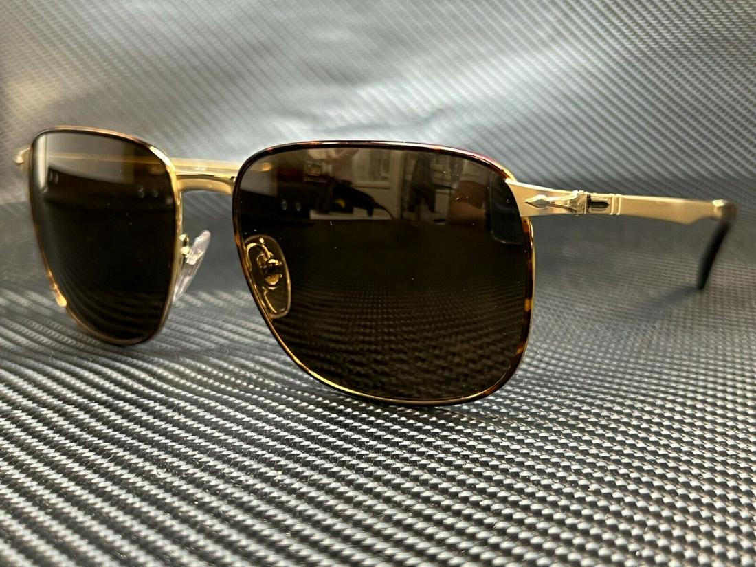 PERSOL PO2463S 107653 Gold Rectangle Square Men's 59 mm Sunglasses: PERSOL PO2463S 107653 Gold Rectangle Square Men's 59 mm Sunglasses Style: Rectangle Type: Sunglasses Brand: Persol Frame Color: Gold New The BIDHAUS Guarantee: All items in this auction are guaranteed