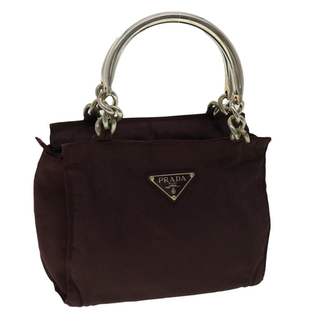PRADA Hand Bag Nylon Brown: PRADA Hand Bag Nylon Brown Brand: PRADA Style: Hand Bag Material: Nylon Exterior Color: Brown Bag Height: 7.9inch(Approx) / 20cm(Approx) Bag Depth: 4.7inch(Approx) / 12cm(Approx) Bag Length: 9.8inch(A