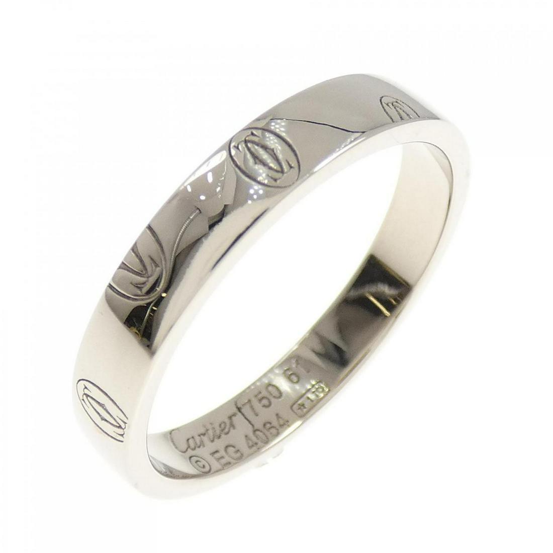 Cartier Logo Ring: Cartier Logo Ring Brand: Cartier Style: Ring Material: 750 White Gold Gender: Unisex Size: 20.5 (JPN size) (61) Accessories: No accessories Main Stone: No stones Weight: Weight about:5.7g Actualsize: 