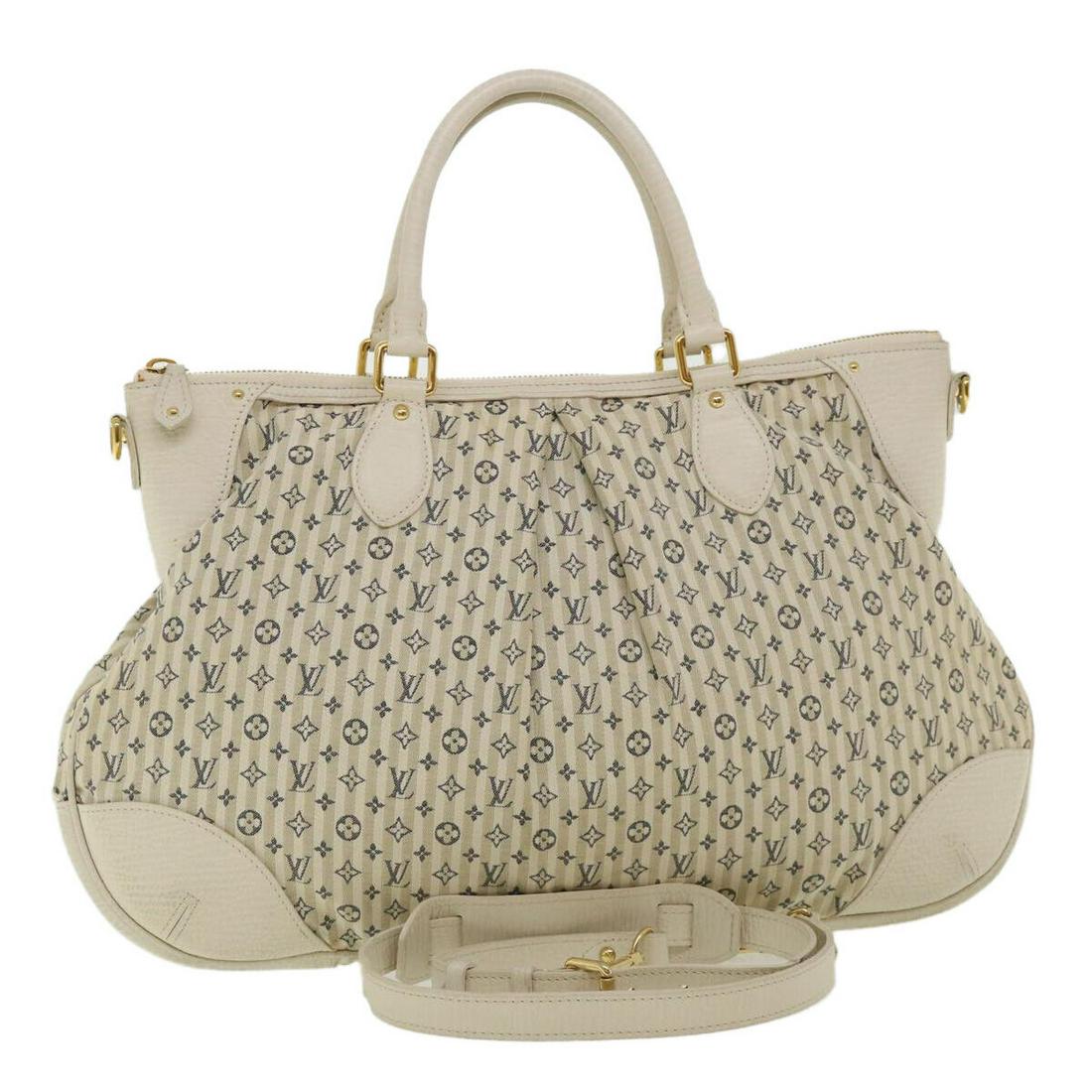 LOUIS VUITTON Monogram Mini Lin Croisette Marina GM Bag 2way M95492: LOUIS VUITTON Monogram Mini Lin Croisette Marina GM Bag 2way M95492 Brand: LOUIS VUITTON Style: Shoulder Bag Material: Monogram Mini Lin Canvas Exterior Color: Blue Bag Height: 11.0inch(Approx) / 28cm