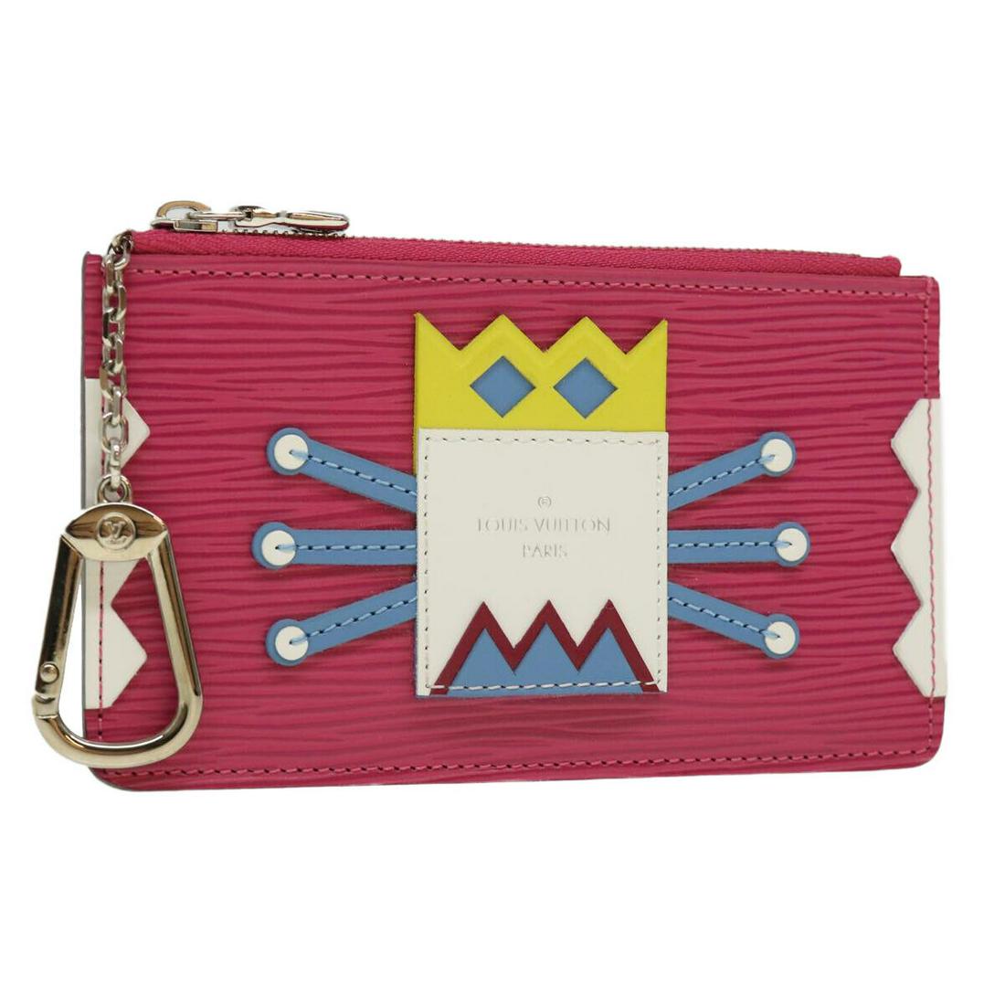 LOUIS VUITTON Epi Tribal mask Pochette Cles Coin Purse Pink M60788: LOUIS VUITTON Epi Tribal mask Pochette Cles Coin Purse Pink M60788 Brand: LOUIS VUITTON Style: Coin Purse Material: Epi Leather Color: Pink Bag Height: 3.3inch(Approx) / 8.5cm(Approx) Bag Depth: 0.2in