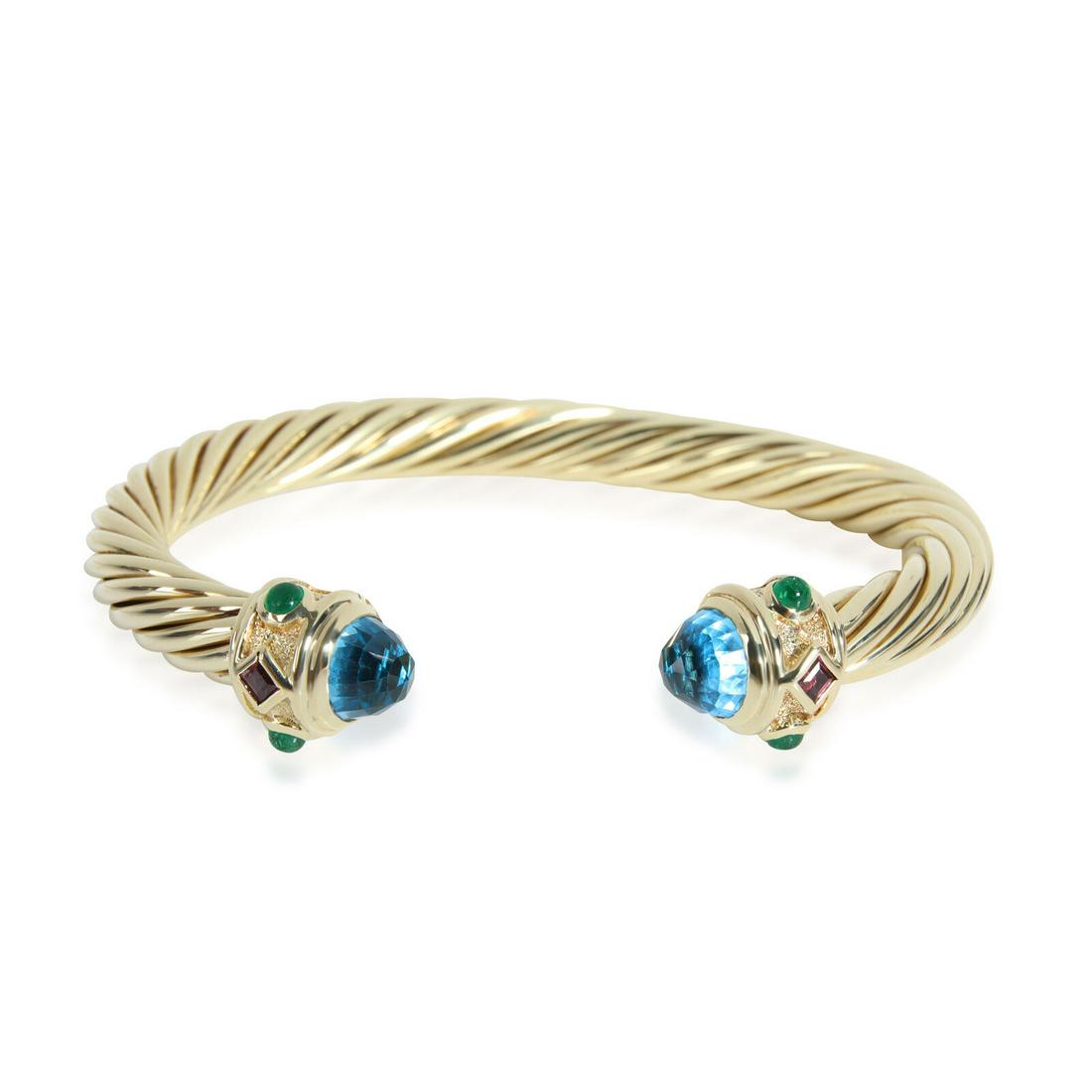 David Yurman Renaissance Blue Topaz Bangle in 14K Yellow Gold: David Yurman Renaissance Blue Topaz Bangle in 14K Yellow Gold Item Length: 6.5 in Side Stone Type: No Stone Main Stone: Topaz Metal Purity: 14K With Original Box/Packaging: No With Papers: No Gross We