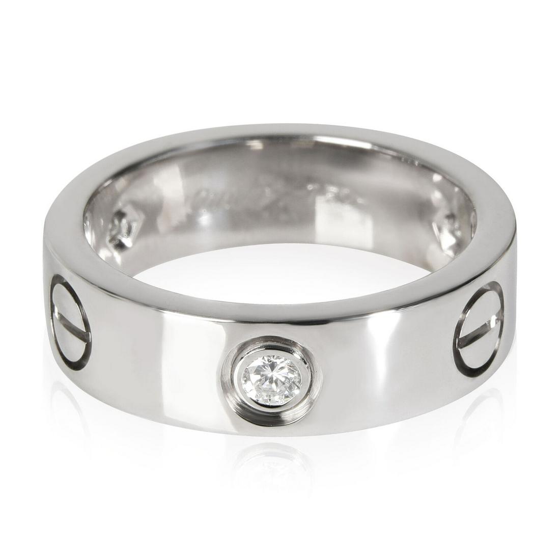 Cartier Love Diamond Ring in 18k White Gold 0.22 CTW: Cartier Love Diamond Ring in 18k White Gold 0.22 CTW Shape: Round Brilliant Side Stone Type: Diamond Side Stone Weight (Cts): 0.22 Metal Purity: 18k With Original Box/Packaging: No With Papers: No Gro