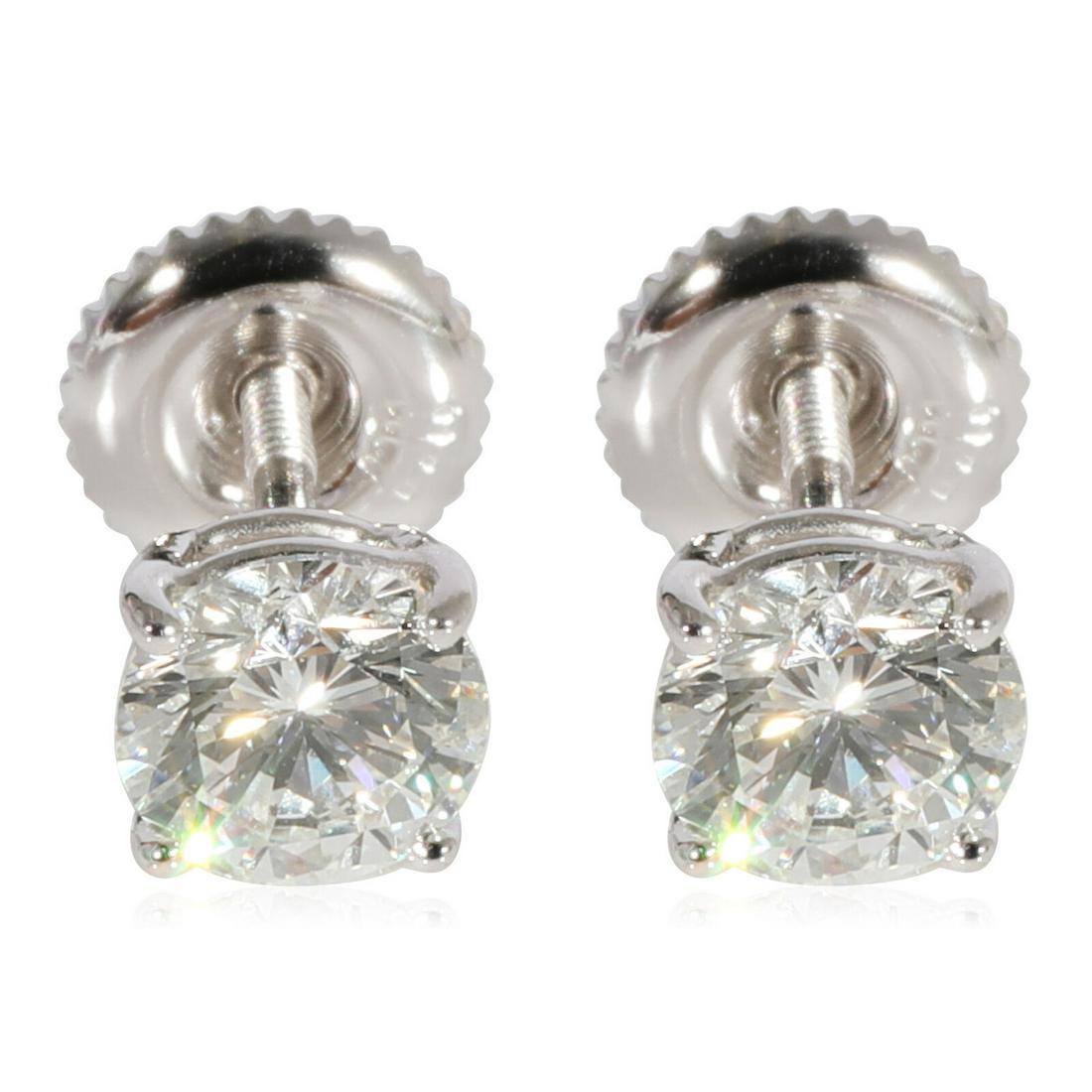 Round Diamond Stud Earrings in 14k White Gold 1 CTW: Round Diamond Stud Earrings in 14k White Gold 1 CTW Shape: Round Brilliant Side Stone Type: Diamond Side Stone Weight (Cts): 1.00 Metal Purity: 14k With Original Box/Packaging: No With Papers: No Gros