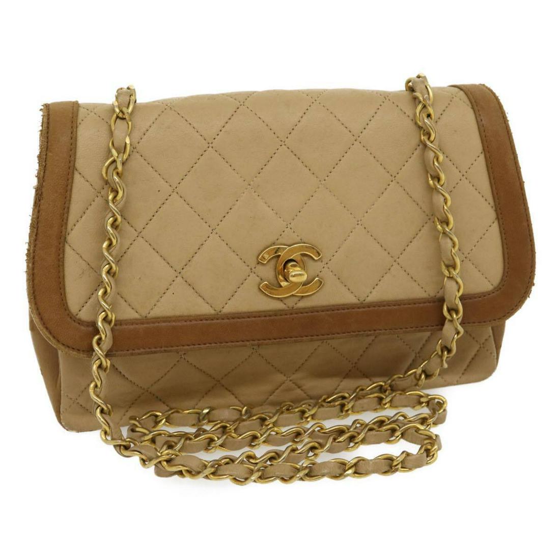 CHANEL Matelasse Chain Shoulder Bag Lamb Skin Beige Gold CC (#0045A) on Mar 27, 2023 | Bidhaus in NY CHANEL Matelasse Chain Shoulder Bag Lamb Skin Beige Gold CC (#0045A) on Mar 27, 2023 | Bidhaus in NY