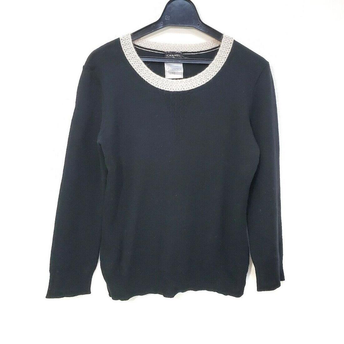 CHANEL U01657 Womens Sweater Black Cream #40: CHANEL U01657 Womens Sweater Black Cream #40 Brand: CHANEL Style: Sweater Color: Black Cream Material: Wool Cashmere Model Number: U01657 Date Code/Stamp: 05A Accessories: None Type: Sweater Size: 40 