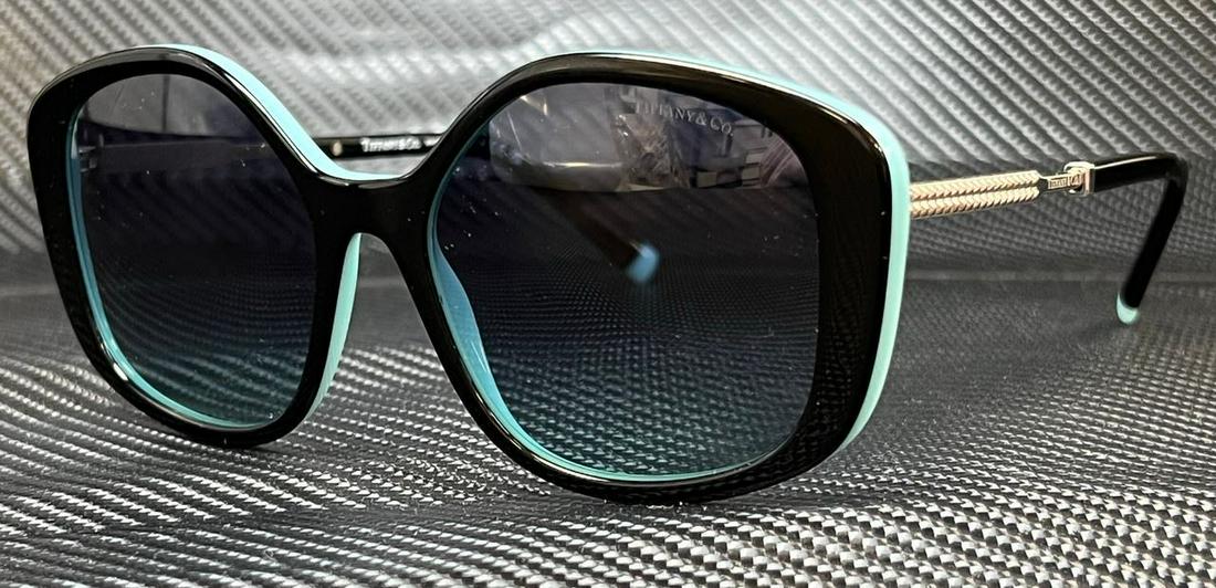 TIFFANY & co. TF4192 80559S Black Blue Gradient Women's 54 mm Sunglasses: TIFFANY & co. TF4192 80559S Black Blue Gradient Women's 54 mm Sunglasses Brand: Tiffany & Co. Frame Color: Black Type: Sunglasses New The BIDHAUS Guarantee: All items in this auction are guaranteed to