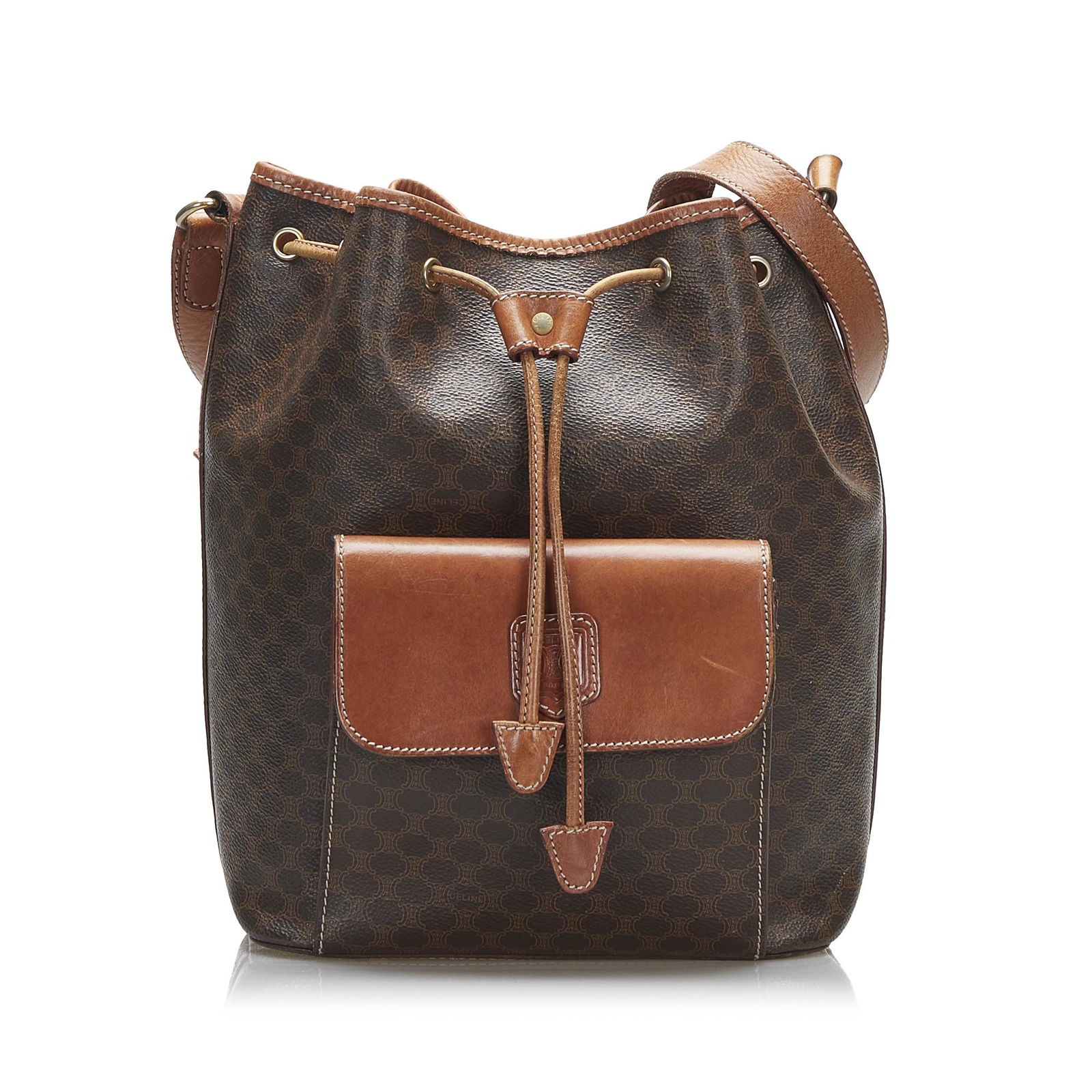 Celine Macadam Bucket Bag: Celine Macadam Bucket Bag This bucket bag features a coated canvas body with leather trim a flat leather shoulder strap a drawstring closure an exterior flap pocket and an interior zip pocket. Brand: