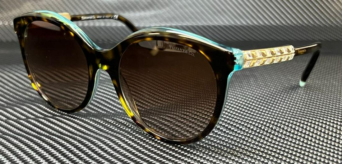 TIFFANY & co. TF4175B 82863B Havana Brown Gradient 55 mm Women's Sunglasses: TIFFANY & co. TF4175B 82863B Havana Brown Gradient 55 mm Women's Sunglasses Brand: Tiffany & co. Frame Color: Brown Type: Sunglasses New The BIDHAUS Guarantee: All items in this auction are guaranteed