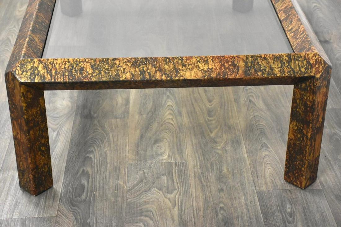 1970s Phyllis Morris Faux Copper Coffee Table: 1970s Phyllis Morris Faux Copper Coffee Table A mid century modern faux copper parsons style coffee table with a smoked glass insert top by Phyllis Morris 60" wide. 36.5" deep. 17.5" tall. Dimensions: