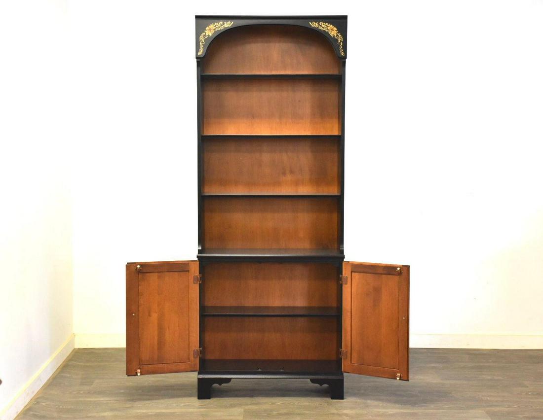 Hitchcock Maple Bookshelf Cabinet: Hitchcock Maple Bookshelf Cabinet A solid maple bookcase with lower cabinets and stenciled front made by Hitchcock Furniture. 30.25" wide. 11.25" deep. 78" tall. Dimensions: 30.25"W x 11.25"D x 78"H S