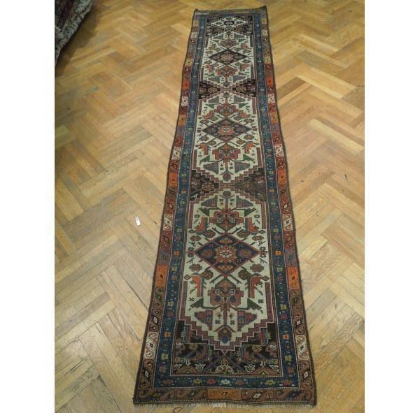 3' x 13' Ivory Antique Persian Runner: 3' x 13' Ivory Antique Persian Runner Size in Feet: Width: 2.8 x Length: 12.8 Size in Inches: Width: 32 in x Length: 152 in Rug Type: Area Rug Colors: Ivory Weave: Hand-knotted Pattern: Persian Origin