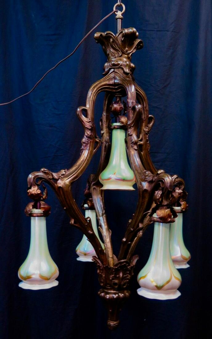 Vintage Art Nouveau Period Chandelier w/ Rare Quezal Shades: Vintage Art Nouveau Period Chandelier w/ Rare Quezal Shades Brand: Quezal Type: Chandelier Pre-Owned PLEASE NOTE: THE ITEMS IN THIS AUCTION ARE NOT HOUSED IN OUR NYC WAREHOUSE. LOCAL PICK UP IS NOT AN
