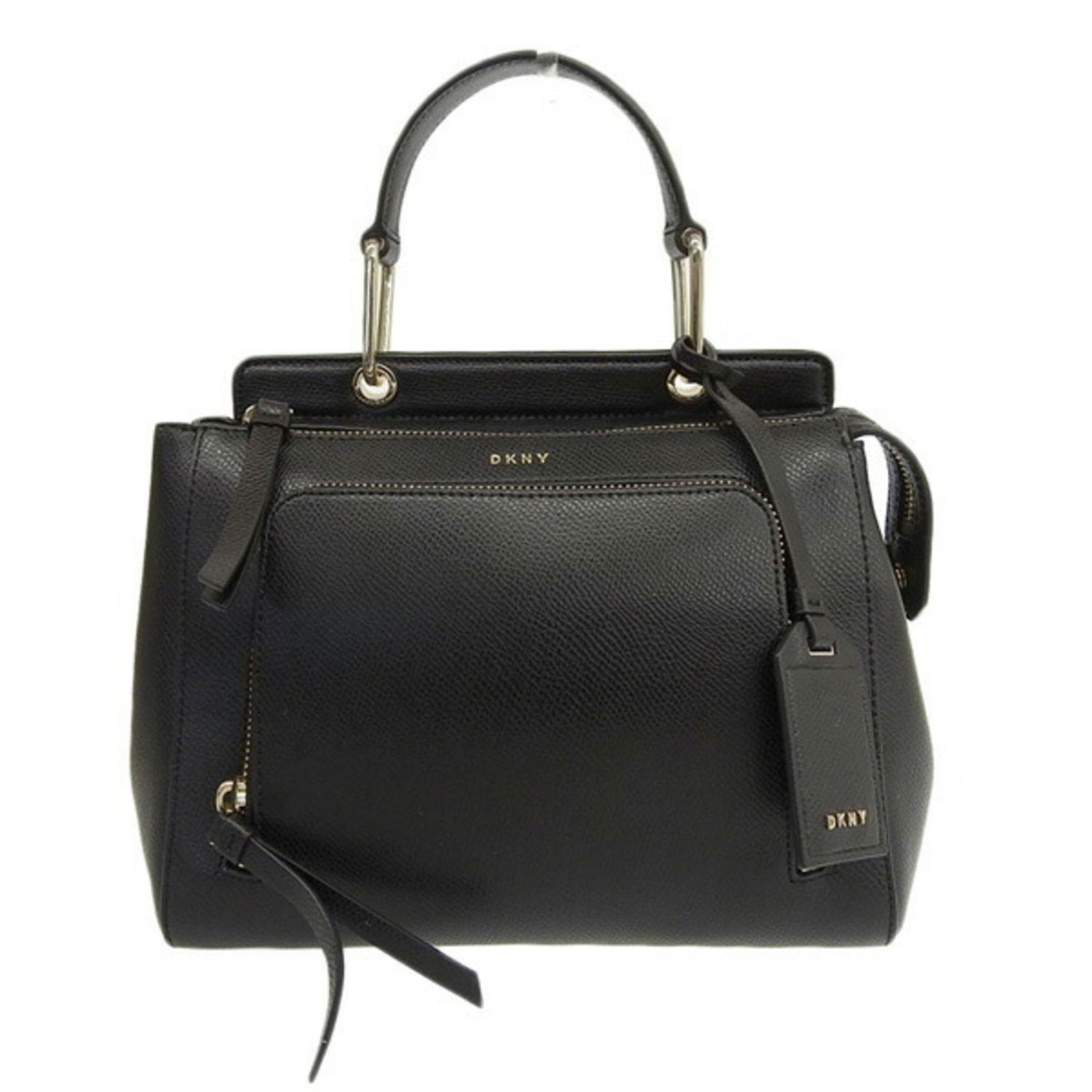DKNY Donna Karan New York Leather Handbag Black: DKNY Donna Karan New York Leather Handbag Black Brand: DKNY Type: Handbag Material: Leather Leather: Color: Black Gender: Women Size (HxWxD): 20cm x 23.5cm x 10.5cm / 7.87 x 9.25 x 4.13 Handle Length: