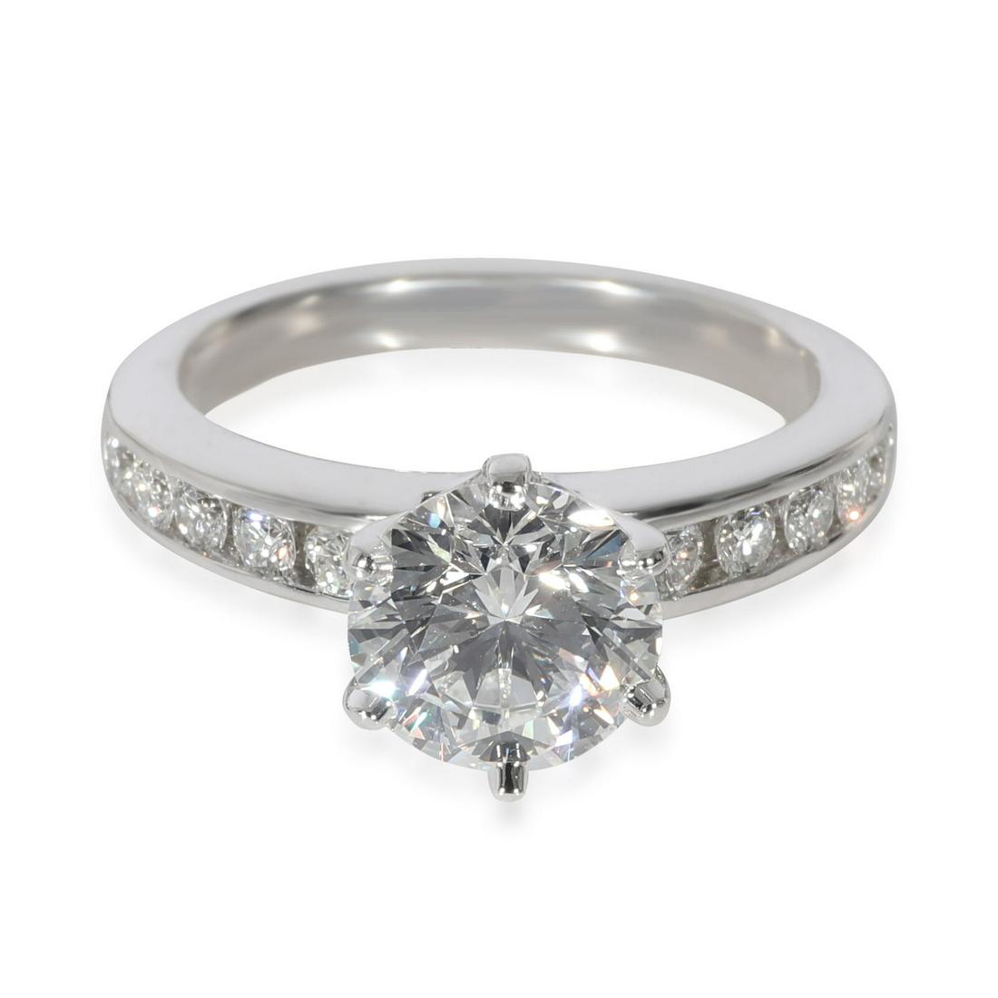 Tiffany & Co. Channel Diamond Engagement Ring in Platinum E VS2 1.88 CTW: Tiffany & Co. Channel Diamond Engagement Ring in Platinum E VS2 1.88 CTW Shape: Round Brilliant With Original Box/Packaging: Yes With Papers: Yes Main Stone Weight (Cts): 1.55 Side Stone Type: No Ston