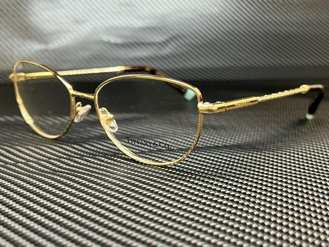 TIFFANY TF1139 6021 Pale Gold Oval Women's 53 mm Eyeglasses: TIFFANY TF1139 6021 Pale Gold Oval Women's 53 mm Eyeglasses Brand: Tiffany & Co. Type: Sunglasses Frame Color: Gold Style: Oval New The BIDHAUS Guarantee: All items in this auction are guaranteed to b