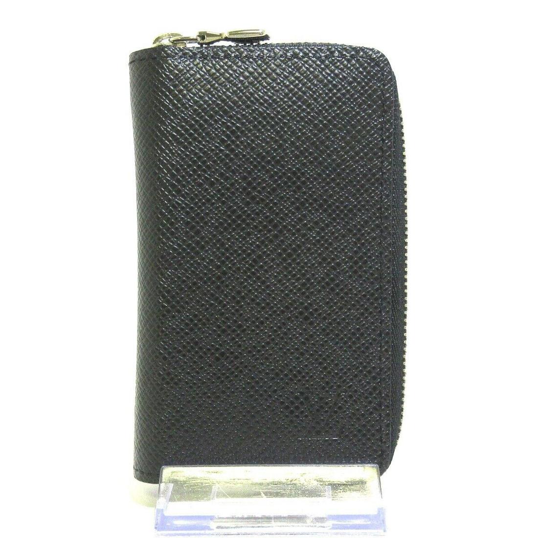 LOUIS VUITTON Zippy Coin Purse M30511 Noir Taiga MI1139 Coin Case: LOUIS VUITTON Zippy Coin Purse M30511 Noir Taiga MI1139 Coin Case Brand: LOUIS VUITTON Style: Coin Case Color: Noir Material: Taiga Leather (LV logo engraved) Model Number: M30511 Product Name: Zippy 