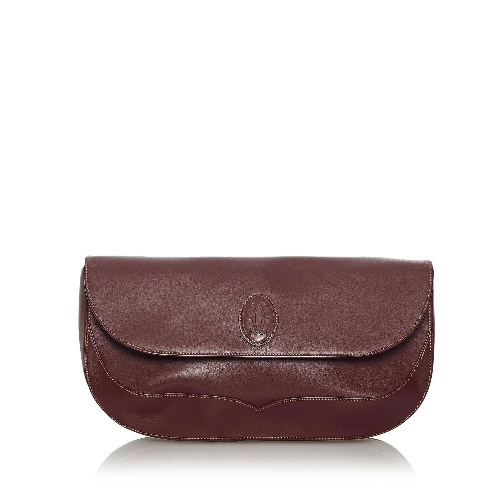 Must de Cartier Leather Clutch Bag: Must de Cartier Leather Clutch Bag The Must De Cartier clutch bag features a leather body a front flap with a magnetic closure and an interior zip pocket. Brand: Cartier Model: Must de Cartier Leather