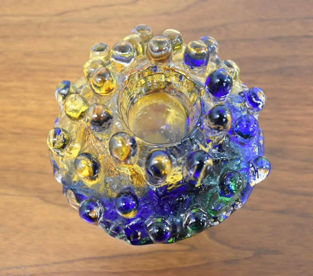 Crystal Series Polar Glass Candlestick Holder by Goran Warff: Crystal Series Polar Glass Candlestick Holder by Goran Warff A beautifully blown glass candlestick holder made and signed by Goran Warff. Kosta Boda 7" wide. 7" deep. 7" tall. Dimensions: 7"W x 7"D x