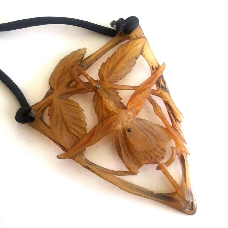 Large Art Nouveau Hand Carved Tortoise Shell Pendant circa 1890 Paris: Large Art Nouveau Hand Carved Tortoise Shell Pendant circa 1890 Paris Dimensions:: Height: 3 in (7.62 cm) Dimensions:: Width: 2 in (5.08 cm) Dimensions:: Depth: 0.25 in (6.35 mm) Style:: Art Nouveau (
