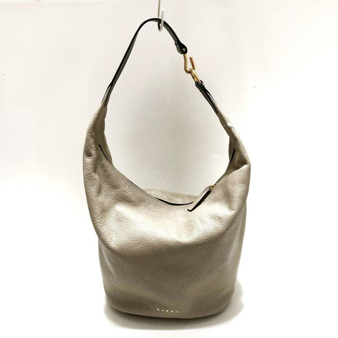 MARNI - Gray Beige Black Leather Shoulder Bag: MARNI - Gray Beige Black Leather Shoulder Bag Style: Shoulder Bag Exterior Color: Gray Beige Black Exterior Material: Leather Accessories: None Type: Shoulder Bag C: Heavily Used The BIDHAUS Guarantee