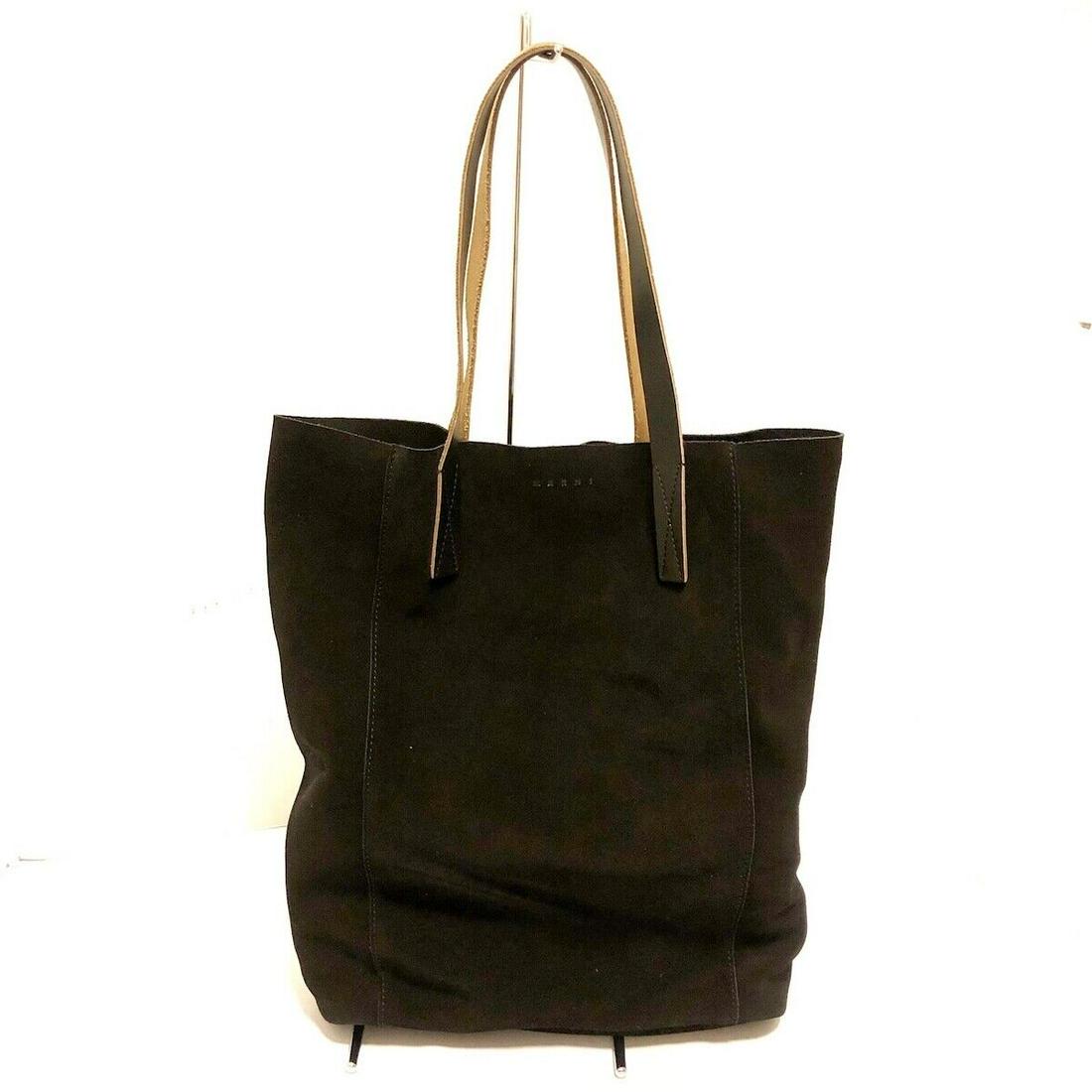 MARNI - SHMPL12A00 Black Suede Leather Tote Bag: MARNI - SHMPL12A00 Black Suede Leather Tote Bag Style: Tote Bag Exterior Color: Black Exterior Material: Suede Leather Accessories: Dust Bag Pouch (detachable) Type: Tote Bag C: Heavily Used The BIDHA