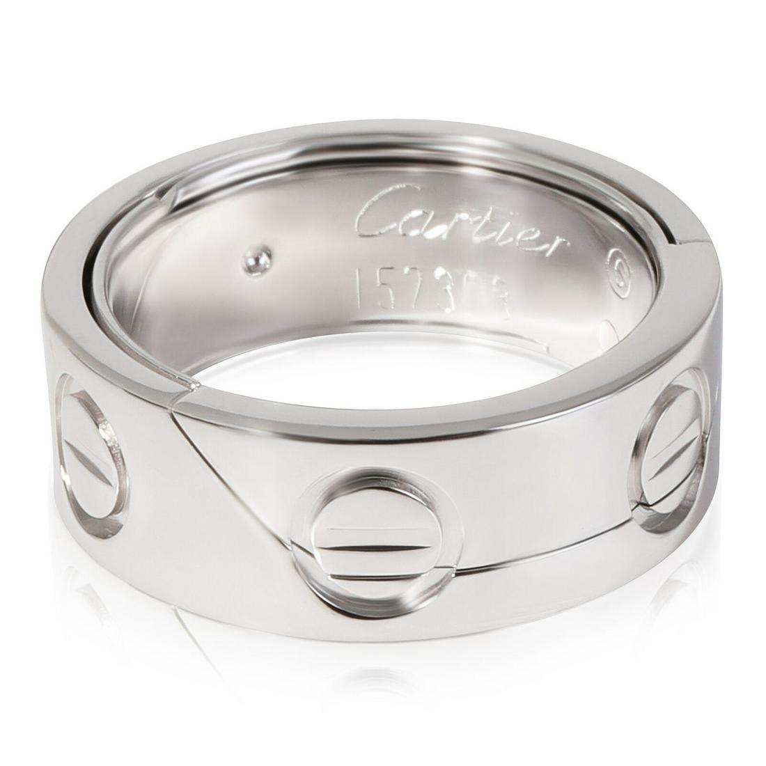 Cartier Love Astro Ring in 18k White Gold: Cartier Love Astro Ring in 18k White Gold With Papers: Yes Side Stone Type: No Stone Metal Purity: 18k With Original Box/Packaging: No Gross Weight (Grams): 12.15 Collection: Love Type: Fashion Ring I