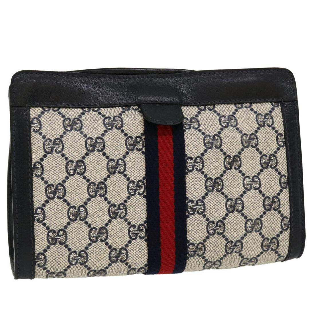 GUCCI GG Canvas Sherry Line Clutch Bag Gray Red Navy 89.01.001: GUCCI GG Canvas Sherry Line Clutch Bag Gray Red Navy 89.01.001 Style: Clutch Bag Material: PVC Leather Exterior Color: Gray / Red / Navy Bag Height: 4.7inch(Approx) / 12cm(Approx) Bag Depth: 2.8inch(A