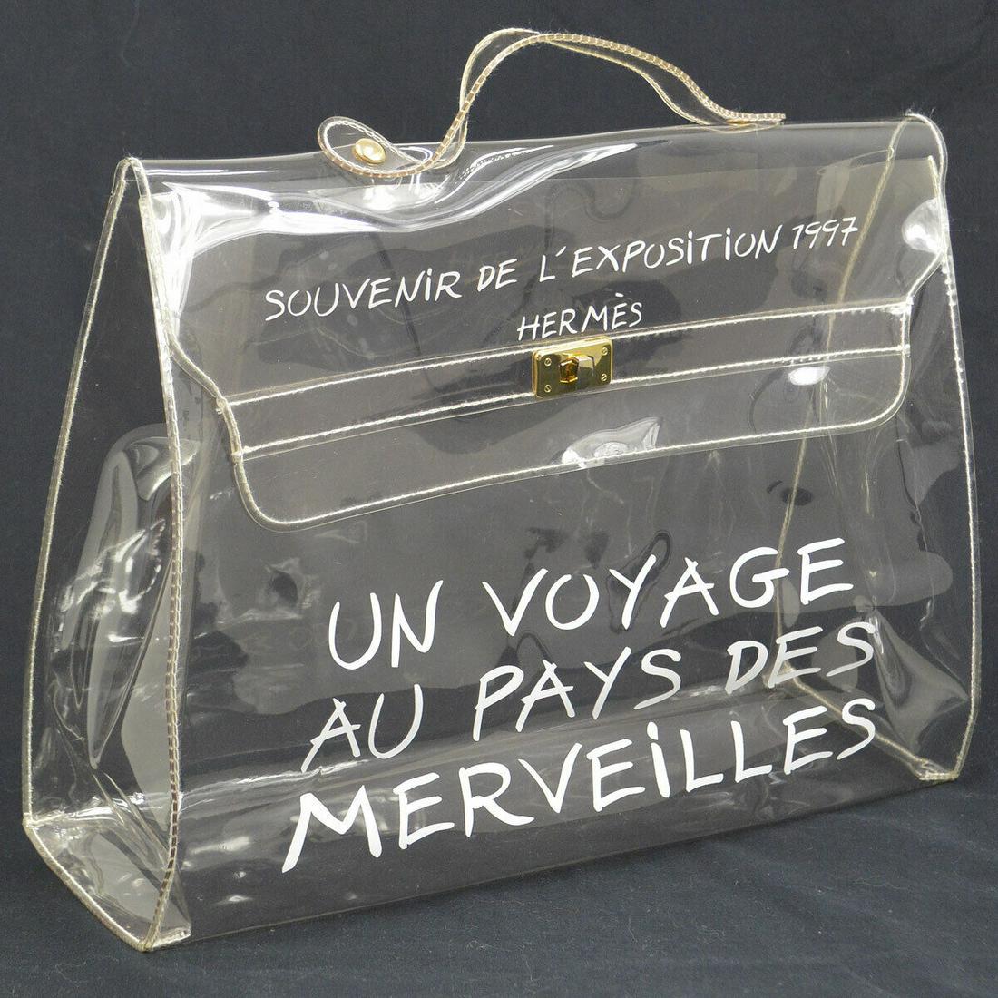 HERMES Vinyl Kelly Beach Hand Bag SOUVENIR DE L'EXPOSITION 1997 Clear: HERMES Vinyl Kelly Beach Hand Bag SOUVENIR DE L'EXPOSITION 1997 Clear Features: Hand Tooled Inside Pockets: 0 Exterior Color: Clear Strap Drop: 1.6 Lining Color: Clear Exterior Material: Vinyl Intende