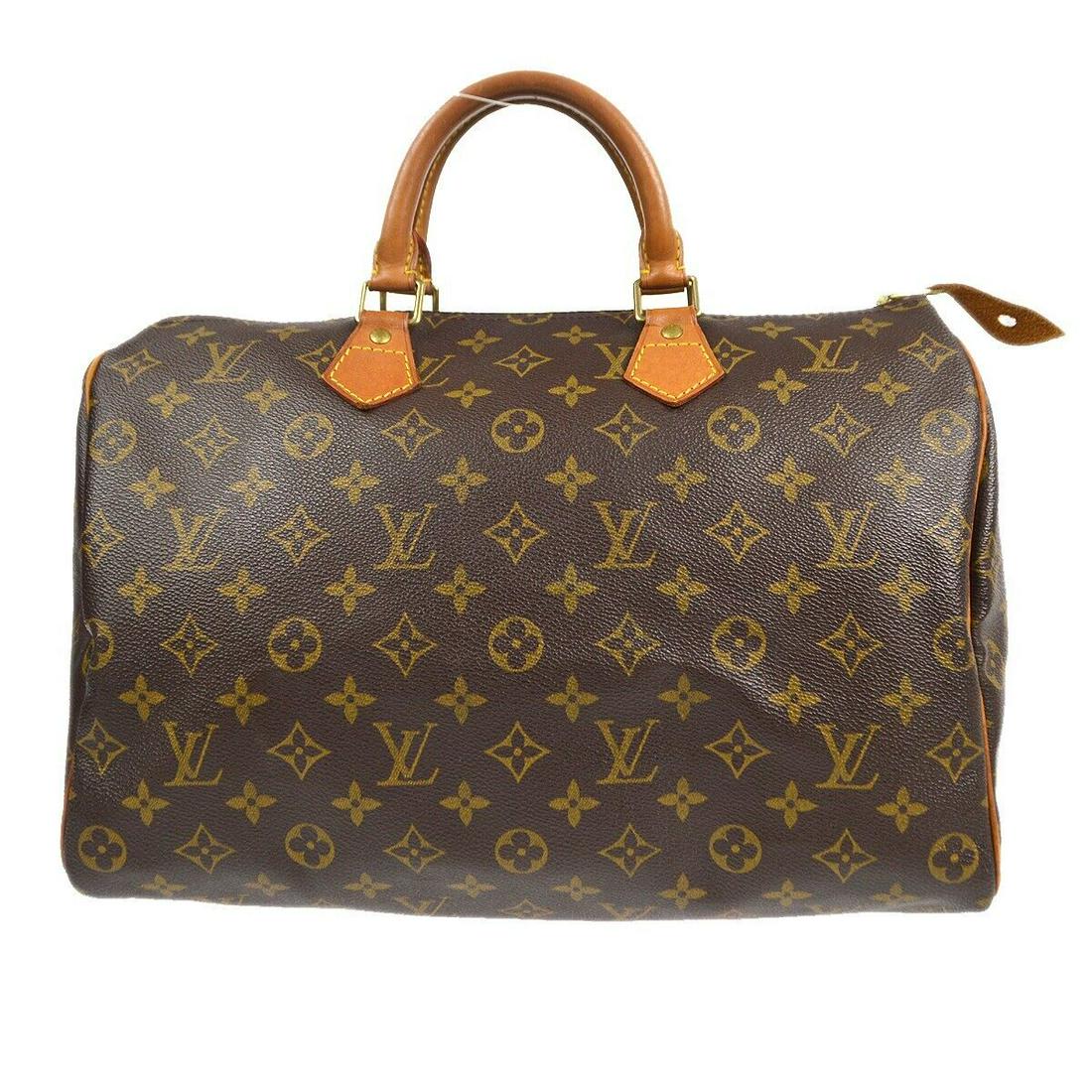 LOUIS VUITTON SPEEDY 35 HANDBAG PURSE MONOGRAM CANVAS M41524 TH0073: LOUIS VUITTON SPEEDY 35 HANDBAG PURSE MONOGRAM CANVAS M41524 TH0073 Bag Width: 14 in Pattern: Monogram Closure: Zip Bag Height: 9 in Handle/Strap Color: Brown Occasion: Casual Size: Medium Handle Styl