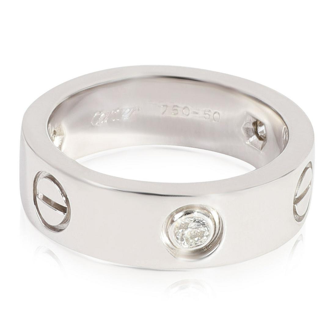 Cartier Love Diamond Ring in 18k White Gold 0.22 CTW: Cartier Love Diamond Ring in 18k White Gold 0.22 CTW Shape: Round Brilliant With Papers: Yes Side Stone Type: Diamond Side Stone Weight (Cts): 0.22 Metal Purity: 18k With Original Box/Packaging: No Gr