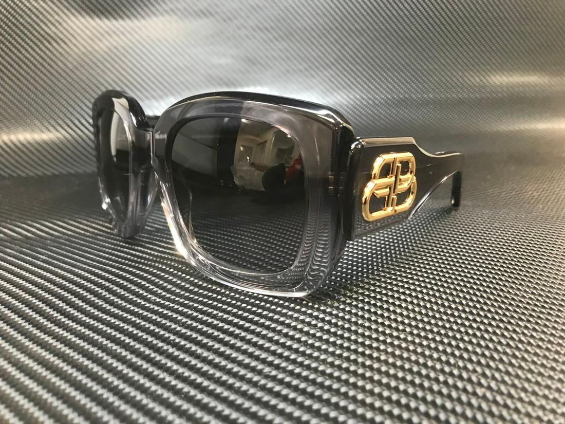 BALENCIAGA BB0069S 003 Grey Square Women's 53 mm Sunglasses: BALENCIAGA BB0069S 003 Grey Square Women's 53 mm Sunglasses Type: Sunglasses Frame Color: Beige Style: Square New The BIDHAUS Guarantee: All items in this auction are guaranteed to be 100% authentic. 