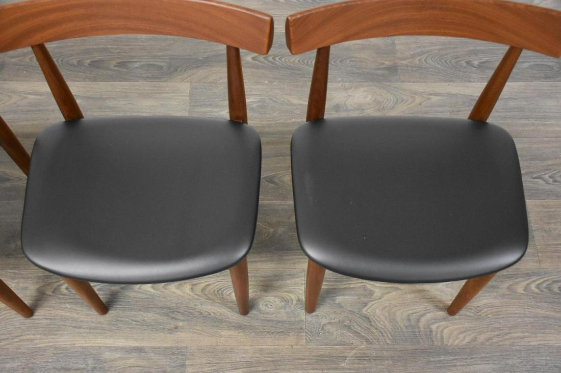 Hans Olsen Walnut Dining Chairs- Set of 4: Hans Olsen Walnut Dining Chairs- Set of 4 A set of four mid century modern walnut dining chairs designed by Hans Olsen for Frem Rojle. Seat height is 16.5" 18" wide. 17.25" deep. 28" tall. Dimensions: