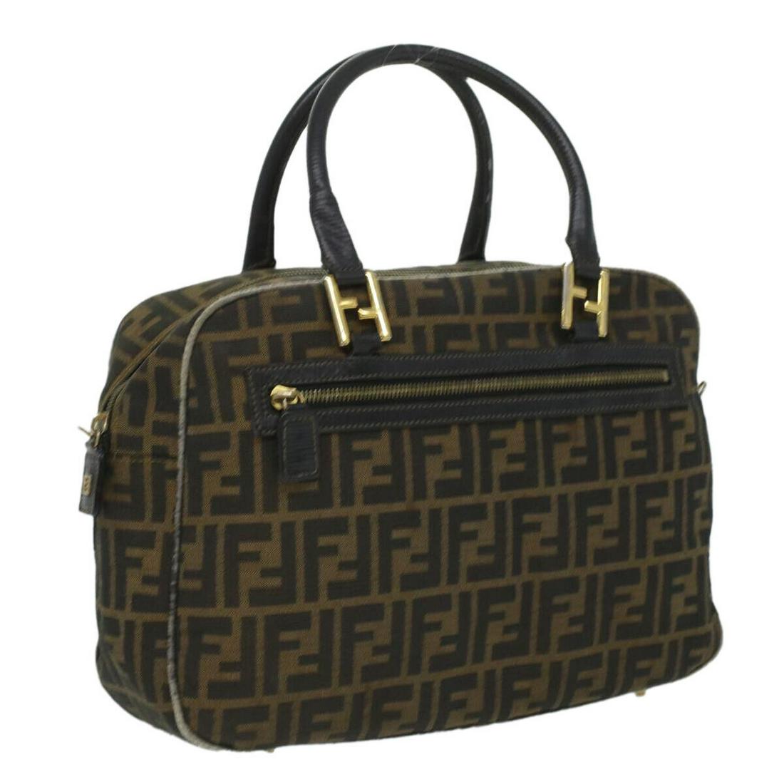 FENDI Zucca Canvas Hand Bag Brown Black: FENDI Zucca Canvas Hand Bag Brown Black Style: Hand Bag Material: Canvas Exterior Color: Brown / Black Bag Height: 10.2inch(Approx) / 26cm(Approx) Bag Depth: 3.9inch(Approx) / 10cm(Approx) Bag Length: