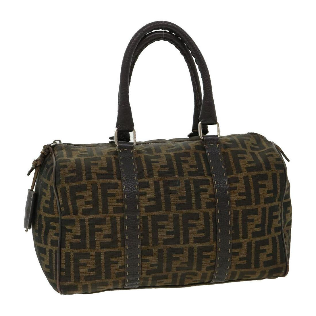 FENDI Zucca Canvas Hand Bag Brown Black: FENDI Zucca Canvas Hand Bag Brown Black Style: Hand Bag Material: Zucca Canvas Exterior Color: Brown / Black Bag Height: 7.5inch(Approx) / 19cm(Approx) Bag Depth: 5.1inch(Approx) / 13cm(Approx) Bag Le