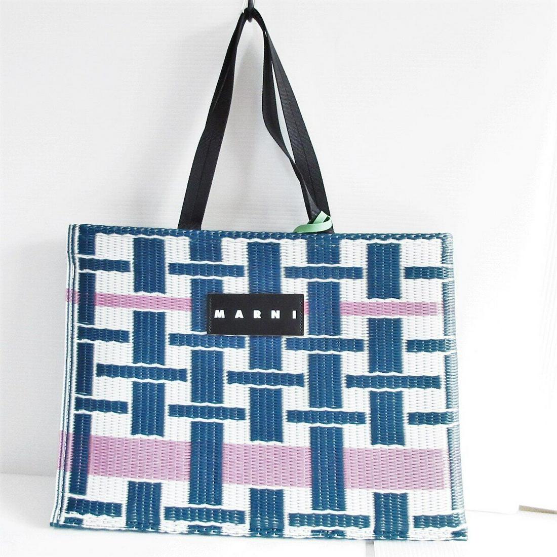 MARNI - Navy White Multi Polypropylene Nylon Leather Tote Bag: MARNI - Navy White Multi Polypropylene Nylon Leather Tote Bag Style: Tote Bag Exterior Color: Navy White Multi Exterior Material: Polypropylene Nylon Leather Accessories: None Type: Tote Bag AB: Very