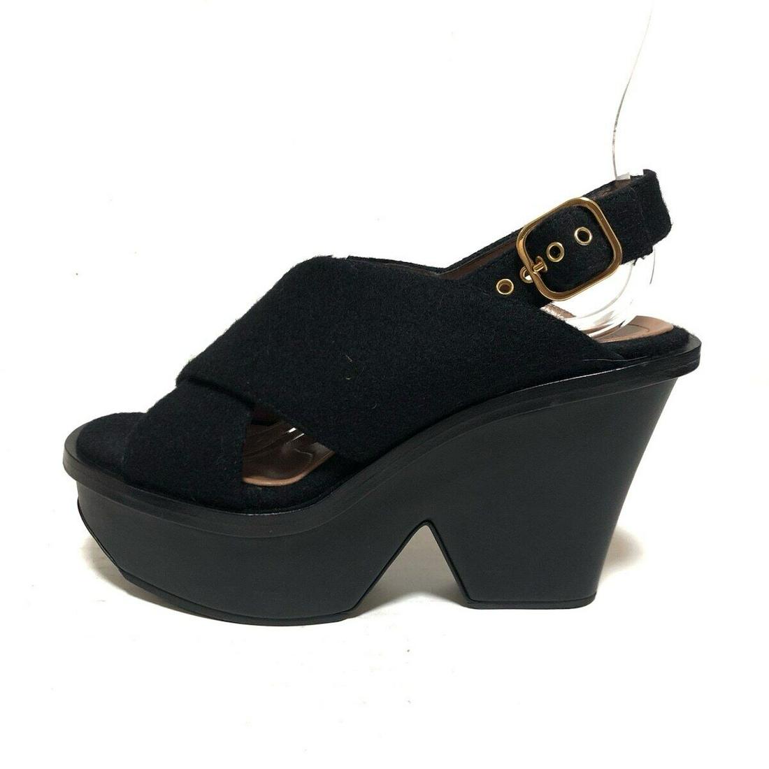 MARNI Wool Womens Sandals Black: MARNI Wool Womens Sandals Black Style: Sandals Color: Black Upper Material: Wool Accessories: None Type: Sandals B: Reasonable Wear and Tear The BIDHAUS Guarantee: All items in this auction are guaran