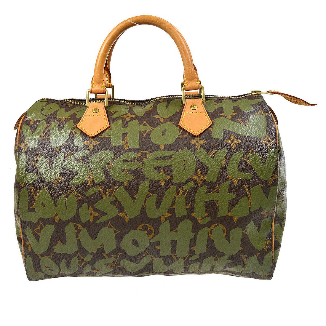 LOUIS VUITTON SPEEDY 30 HAND BAG KHAKI MONOGRAM GRAFFITI M92194 TH0041: LOUIS VUITTON SPEEDY 30 HAND BAG KHAKI MONOGRAM GRAFFITI M92194 TH0041 Size: Medium Accents: Logo Style: Hand Bag Handle Style: Double Handles Bag Height: 9.1 Product Line: Louis Vuitton Monogram Graf