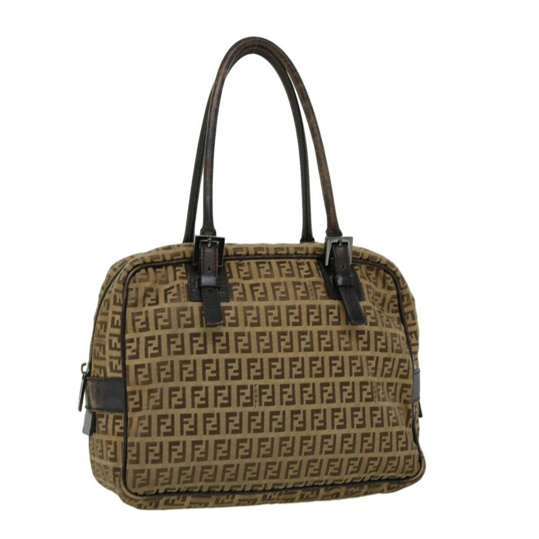FENDI Zucchino Canvas Shoulder Bag Brown: FENDI Zucchino Canvas Shoulder Bag Brown Style: Shoulder Bag Material: Zucchino Canvas Exterior Color: Brown Bag Height: 8.7inch(Approx) / 22cm(Approx) Bag Depth: 5.1inch(Approx) / 13cm(Approx) Bag Le