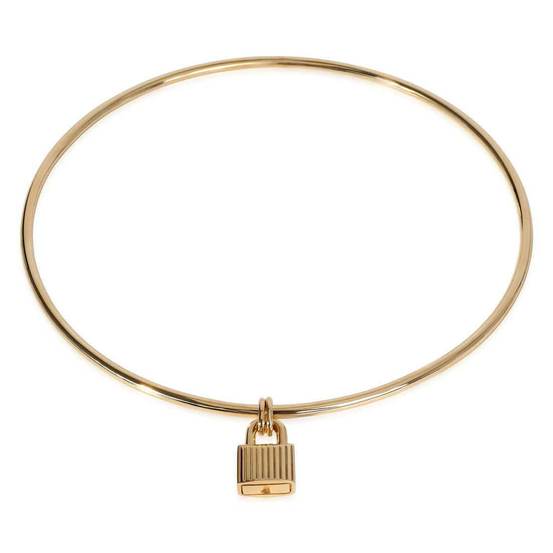 Tom Ford Padlock Choker Necklace in 18k Yellow Gold: Tom Ford Padlock Choker Necklace in 18k Yellow Gold Necklace Length: 14 in With Original Box/Packaging: Yes Side Stone Type: No Stone Metal Purity: 18k With Papers: No Gross Weight (Grams): 27.72 Coll