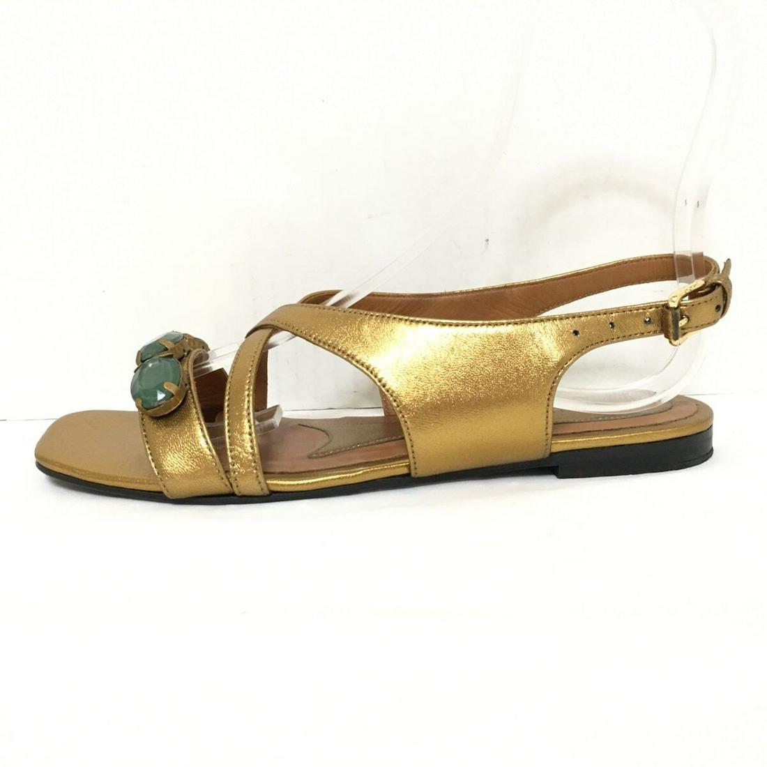 MARNI - Gold Leather Womens Sandals: MARNI - Gold Leather Womens Sandals Style: Sandals Color: Gold Upper Material: Leather Accessories: Box Type: Sandals C: Heavily Used The BIDHAUS Guarantee: All items in this auction are guaranteed to