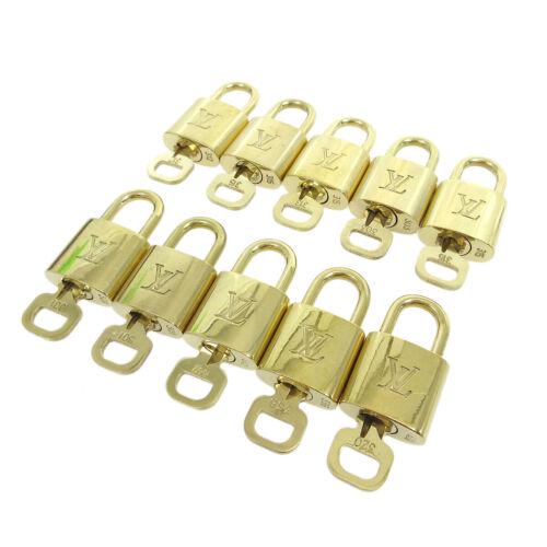 LOUIS VUITTON Padlock & Key Bag Accessories Charm 10 Piece Set Gold: LOUIS VUITTON Padlock & Key Bag Accessories Charm 10 Piece Set Gold Type: Padlock Color: Gold Outside Condition: AB: Very Good/Inside Condition: C: Heavily Used The BIDHAUS Guarantee: All items in thi