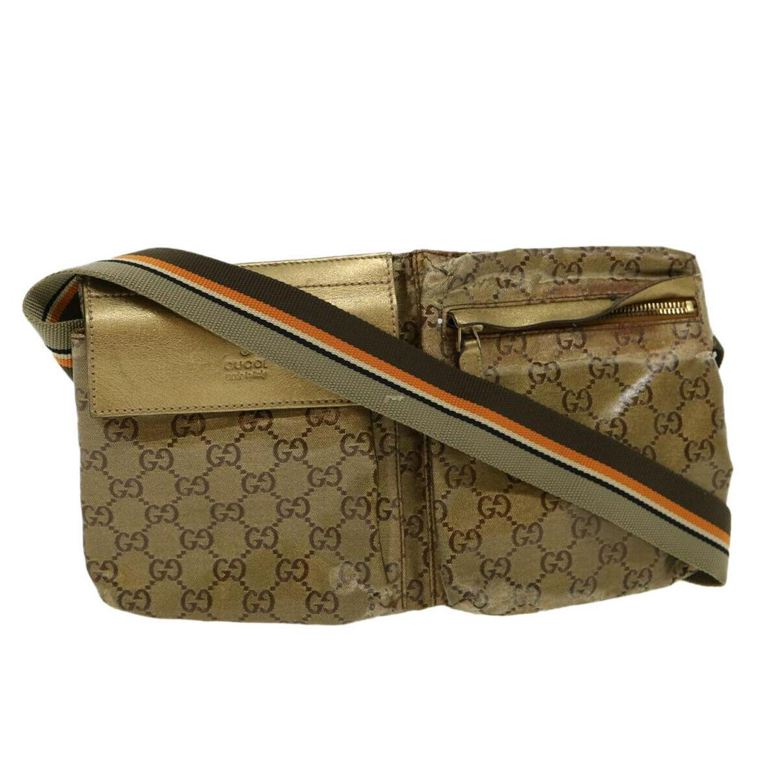 GUCCI GG Canvas Waist Bag Gold: GUCCI GG Canvas Waist Bag Gold Style: Waist Bag Material: Coated Canvas Exterior Color: Gold Bag Height: 6.3inch(Approx) / 16cm(Approx) Bag Depth: 0.8inch(Approx) / 2cm(Approx) Bag Length: 11.4inch(Ap