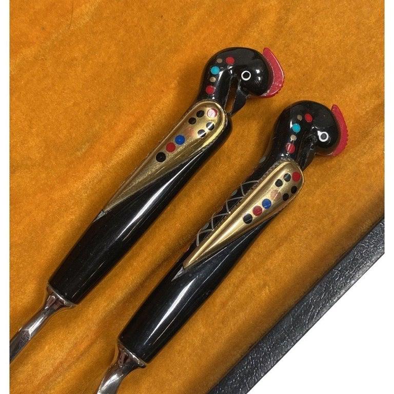 Bar Tools Set With Phoenix Bird Carved Handle Handmade Inlay by Haddad Jezzine: Bar Tools Set With Phoenix Bird Carved Handle Handmade Inlay by Haddad Jezzine Dimensions: Height: 9.5 in (24.13 cm)Width: 1 in (2.54 cm)Depth: 1 in (2.54 cm) Sold As: Set of 4 Style: Mid-Century Mode