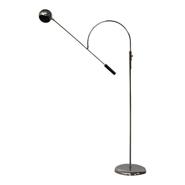 Robert Sonneman 'Orbiter' Chrome Floor Lamp: Robert Sonneman 'Orbiter' Chrome Floor Lamp A modern chrome "Orbiter" floor lamp by Robert Sonneman with an adjustable and rotating arm. 49" wide. 14" wide. 62.75" tall. Dimensions: 49"W x 14"D x 62.7